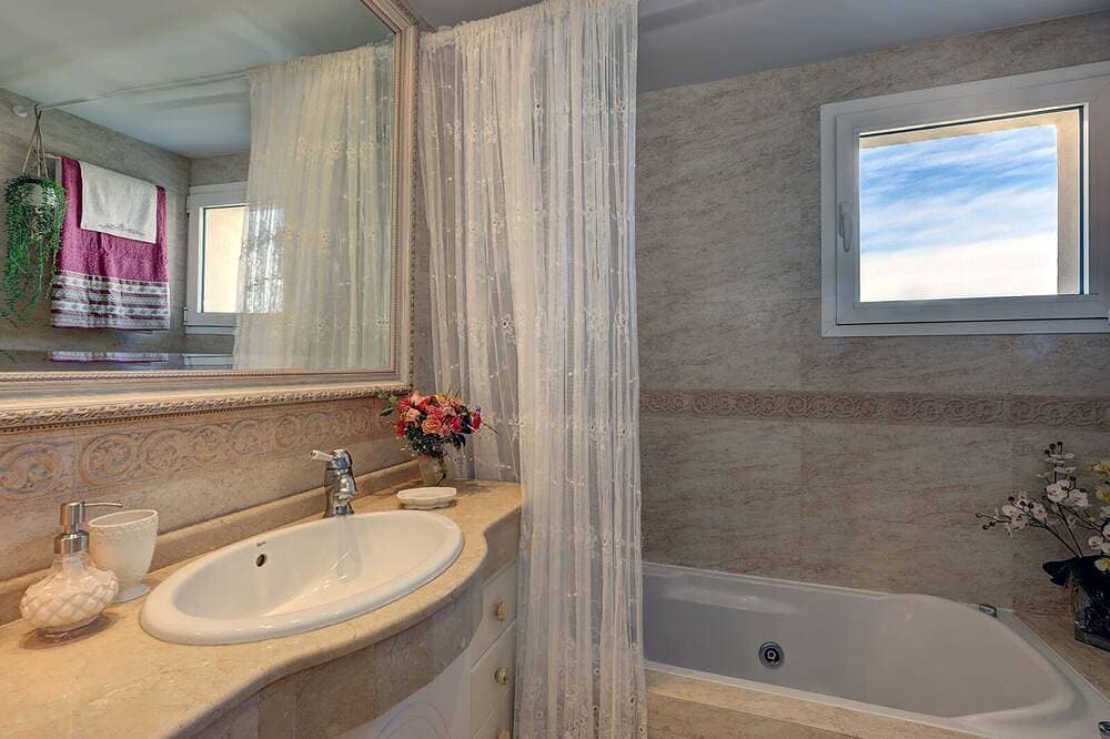 Foto 11 von 30: Apartment-Ensuite mit Bad