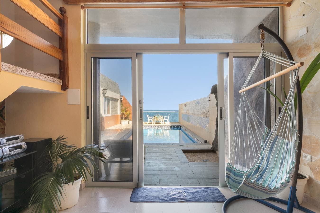 Foto 4 von 35: Ferienhaus 'Seaside House mit beheiztem Pool', Meerblick, WLAN & Klimaanlage