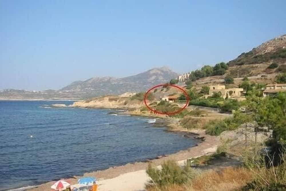 Small house by the sea 1