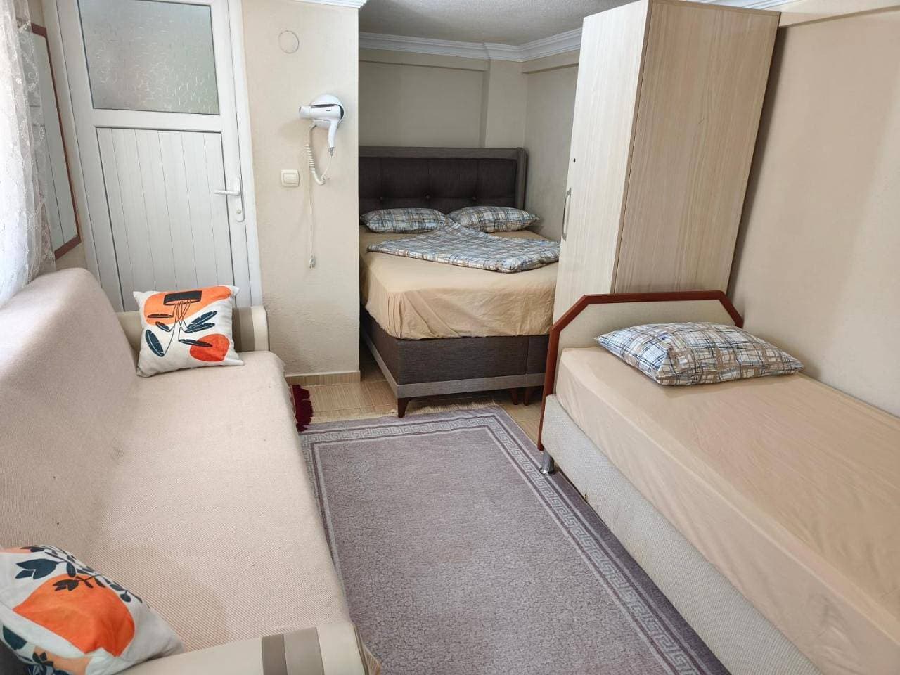 Foto 12 von 26: Quadruple Room with Garden View
