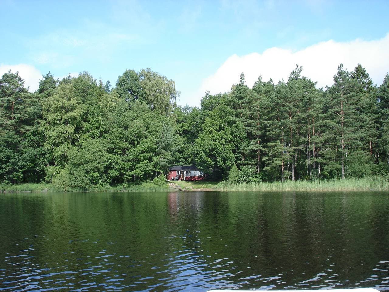 Ferienhaus direkt am Loka-See mit eigenem Boot 1