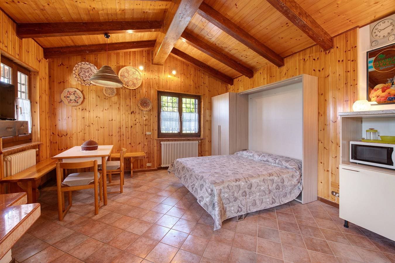 Foto 4 von 30: Ferienhaus 'Delle Delizie' mit Seeblick, privatem Garten und Klimaanlage