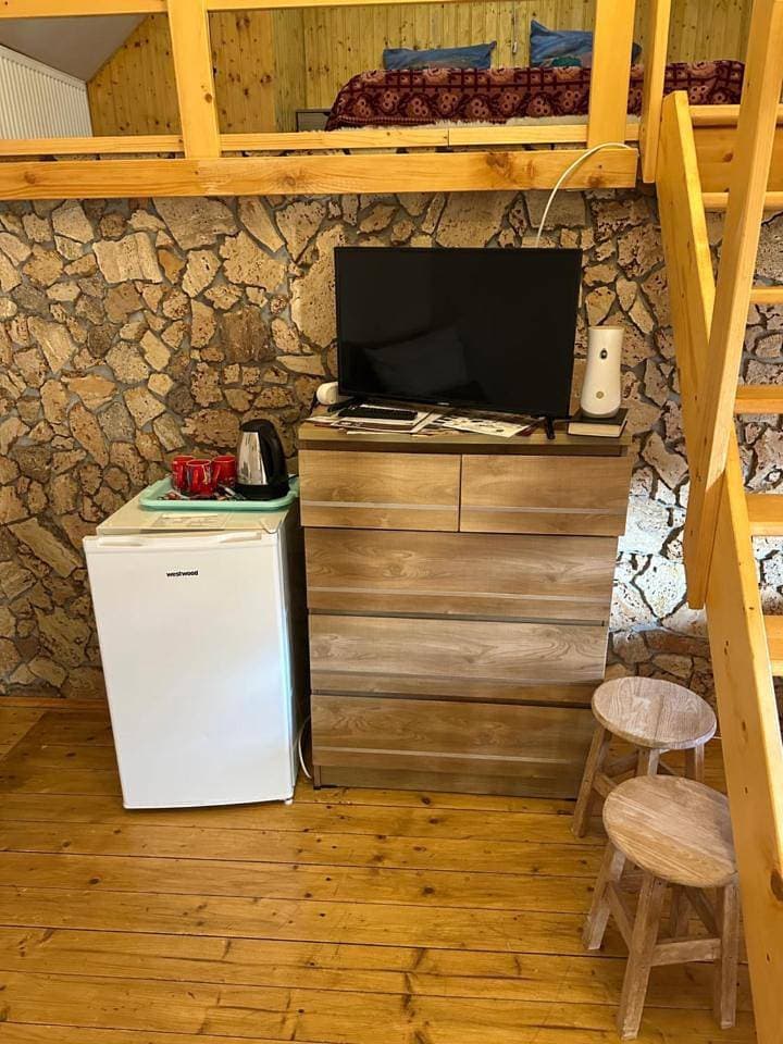 Foto 12 von 16: Triple Room with Private Bathroom