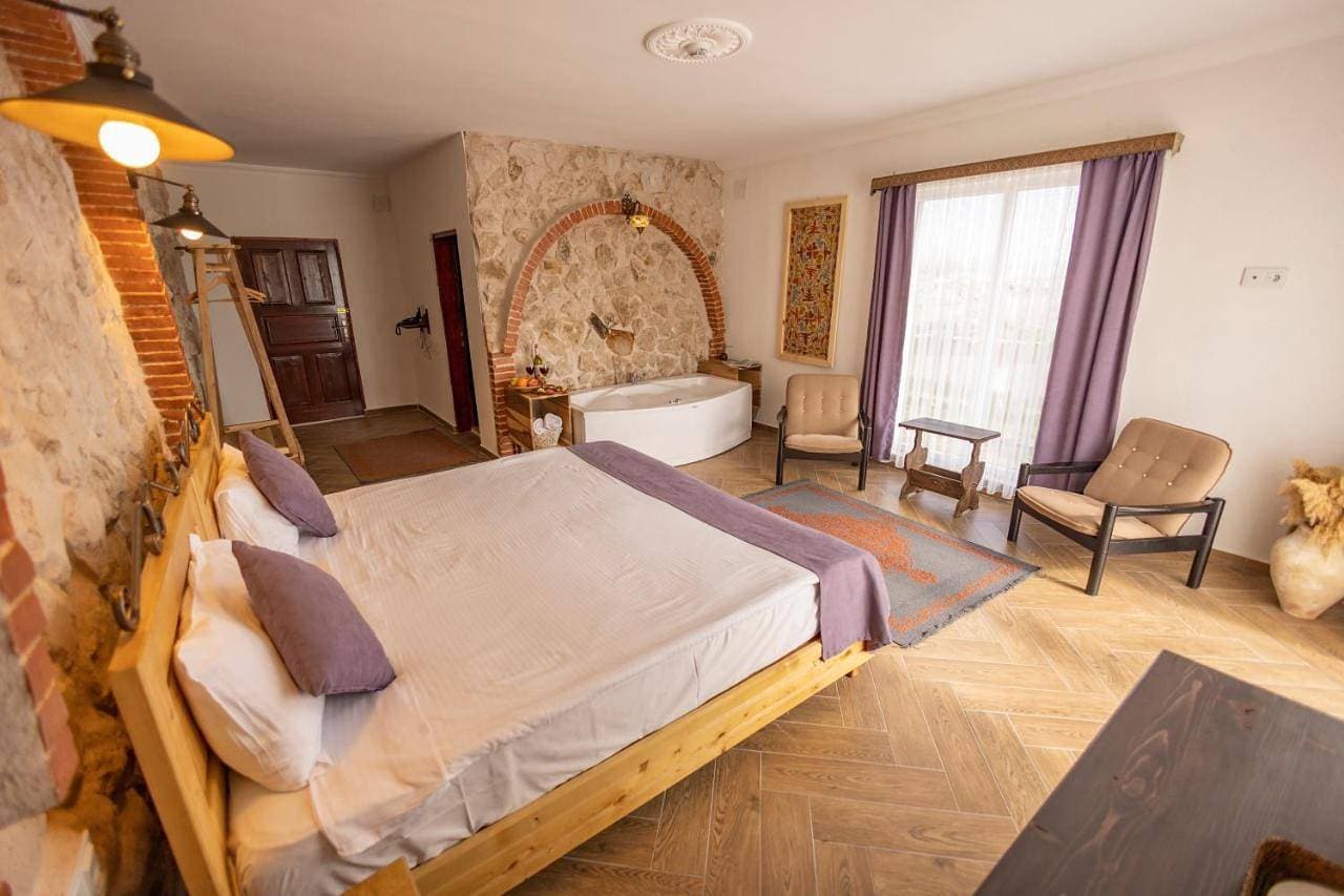 Foto 7 von 19: Queen Suite with Spa Bath