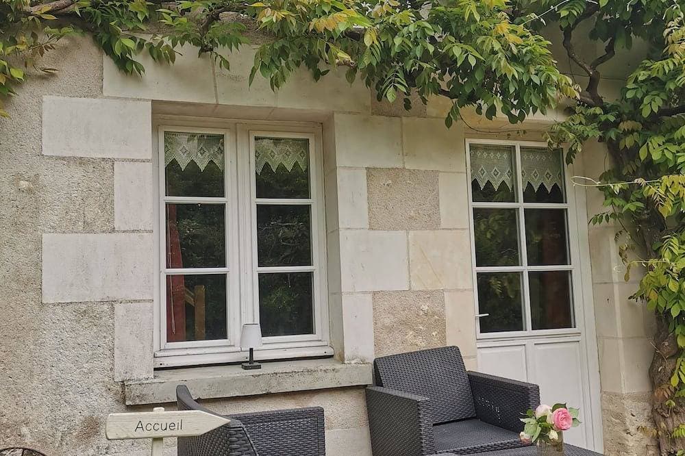 Foto 7 von 7: Detached duplex vacation rental for rent surrounded by wisteria