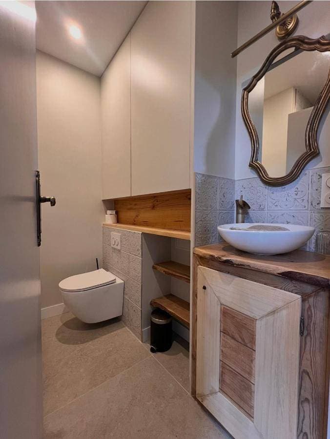 Foto 4 von 5: Triple Room with Private Bathroom