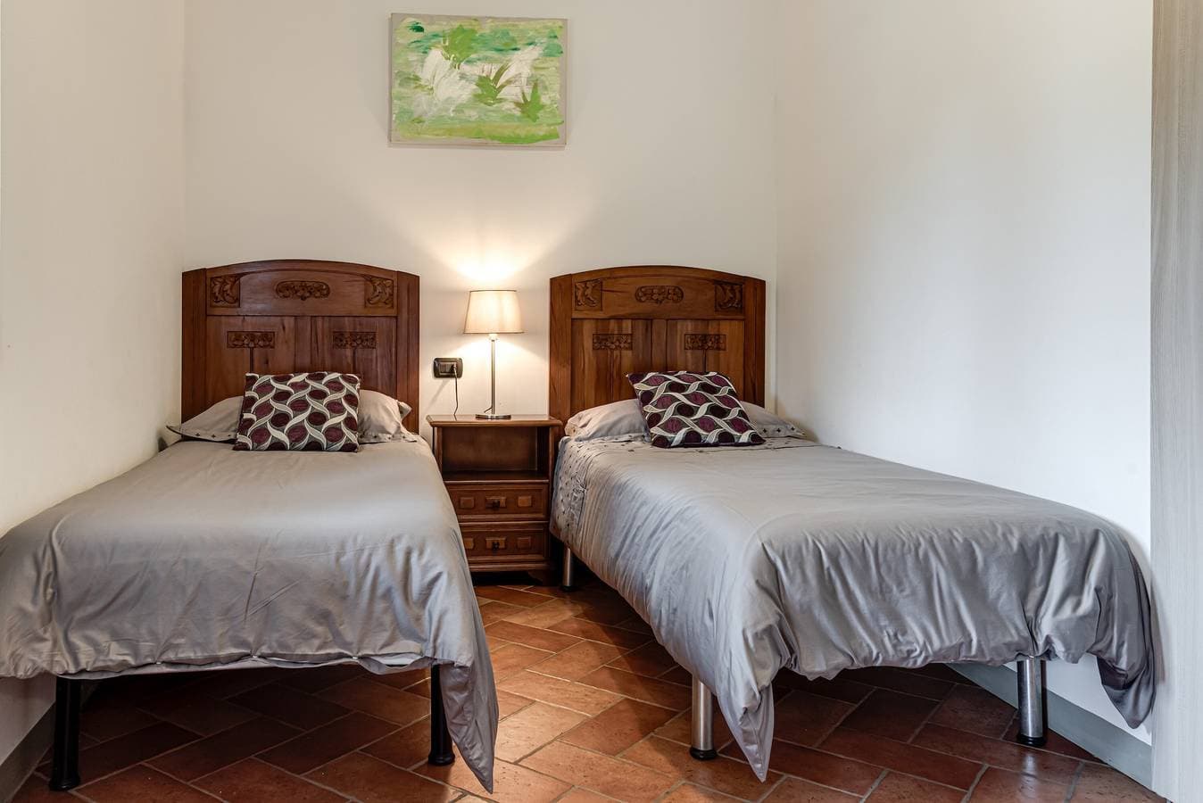Foto 9 von 24: Ferienwohnung 'Il Cerro La Capanna Piano Terra' mit Gemeinschaftspool und Gemeinschaftsgarten