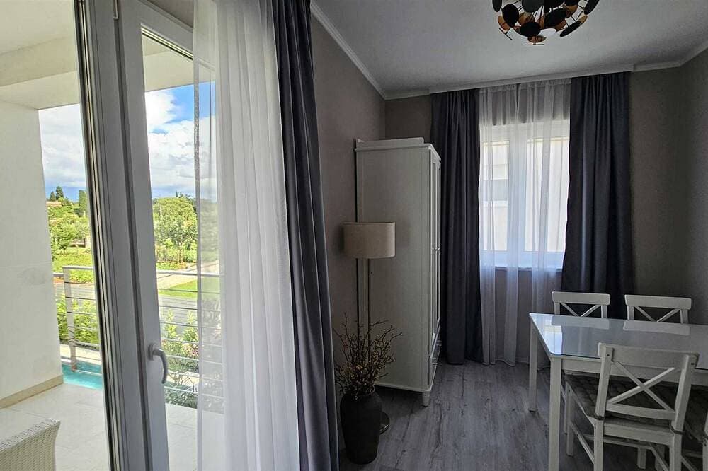 Foto 11 von 24: Casa Bianca Ferienwohnung mit 1 Schlafzimmer mit Balkon 2