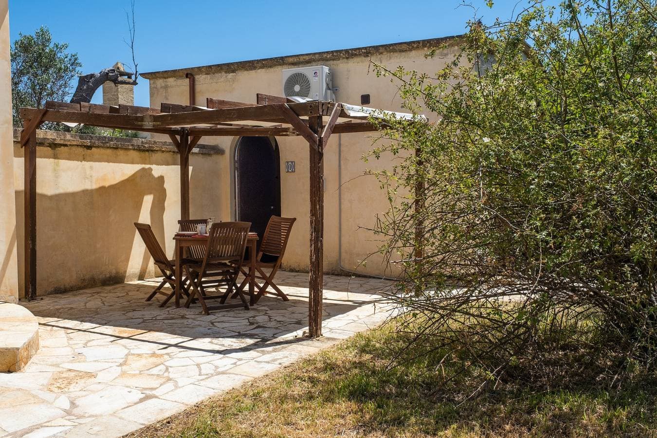 Foto 5 von 20: Appartement 'Residenze Uliveto - Residenza 10' mit Pool, privater Terrasse und Klimaanlage