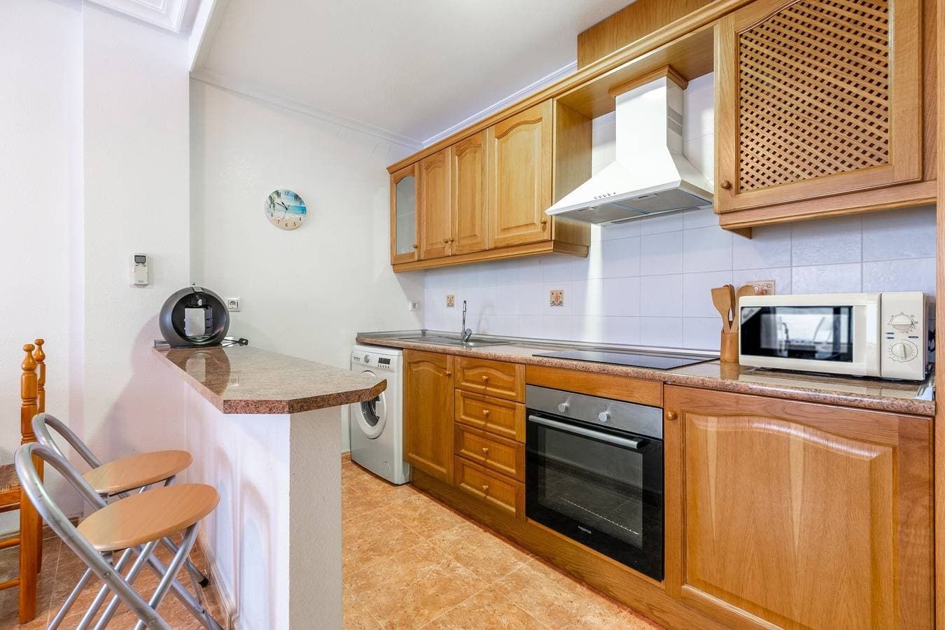 Foto 8 von 26: Ferienwohnung „En El Cabo Roig“ mit Gemeinschaftspool, privatem Balkon & WLAN