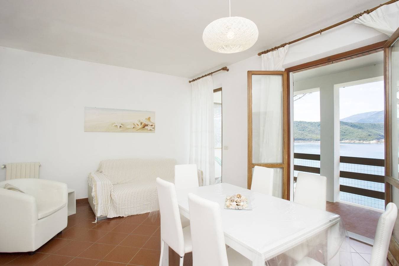 Foto 13 von 32: Ferienwohnung für 6 Personen mit Terrasse