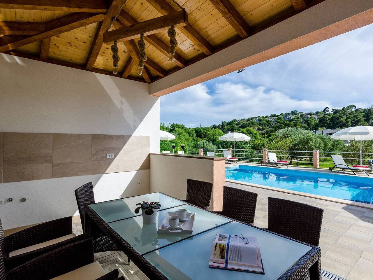 Foto 13 von 16: Apartments Mali Paradiso - Two Bedroom Apartment with Balcony and Pool View (A4)