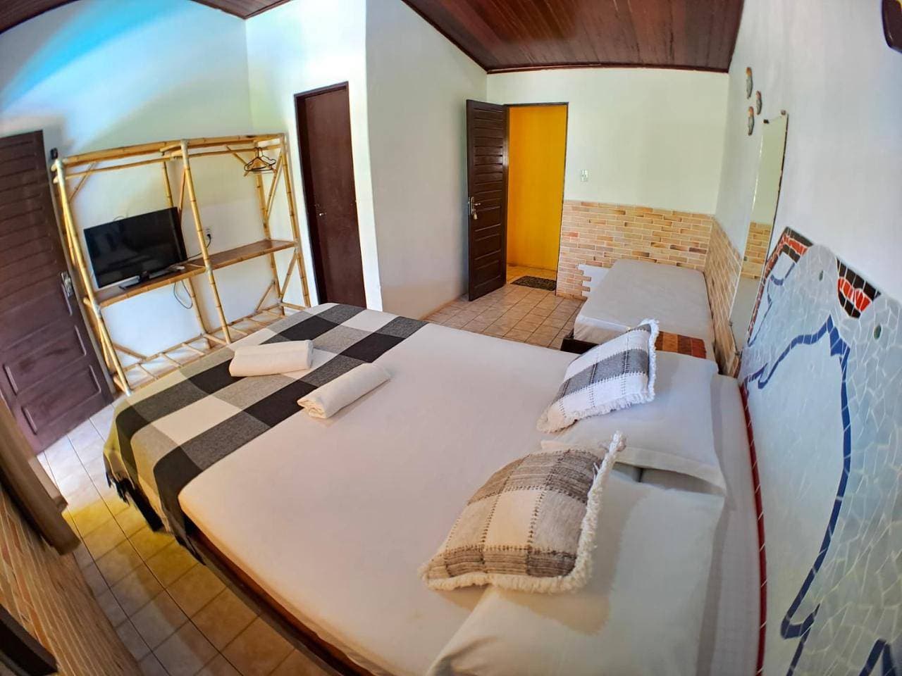 Foto 7 von 12: Triple Room with Pool View