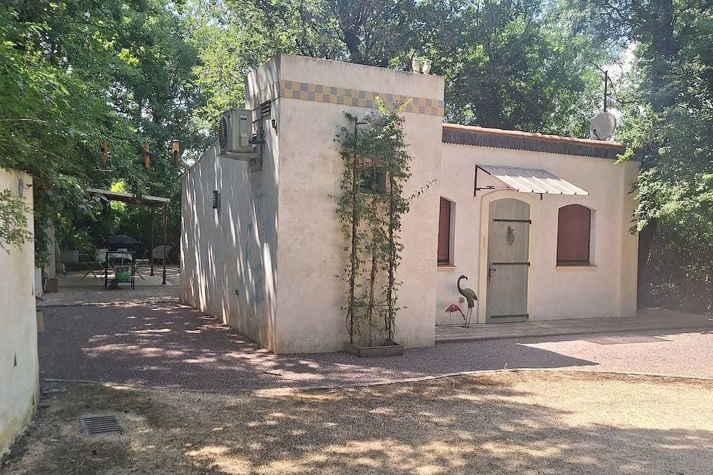 Foto 5 von 9: Studio Avec Terrasse et Pergola Dans Propriété Calme et Sécurisée