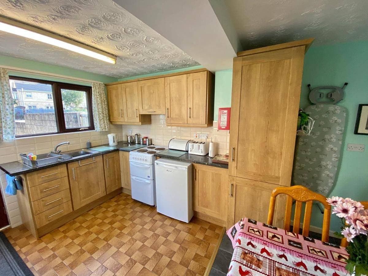 Foto 4 von 14: Three-Bedroom House
