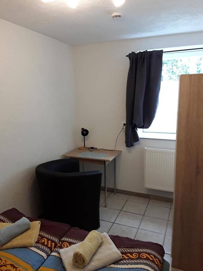 Foto 3 von 8: Triple Room with Bathroom