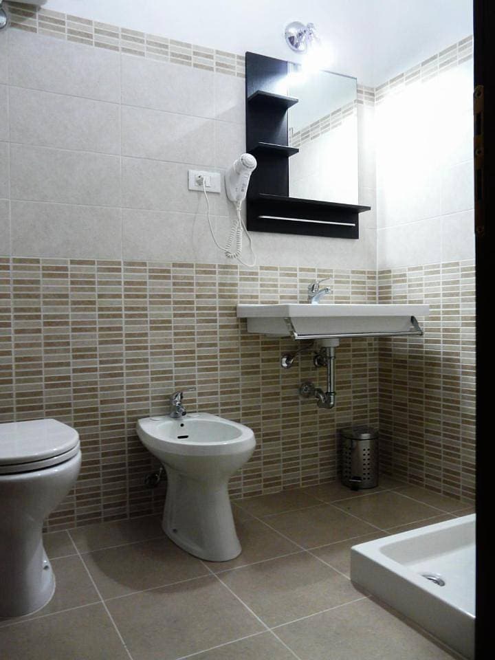 Foto 8 von 12: Double Room with Private Bathroom