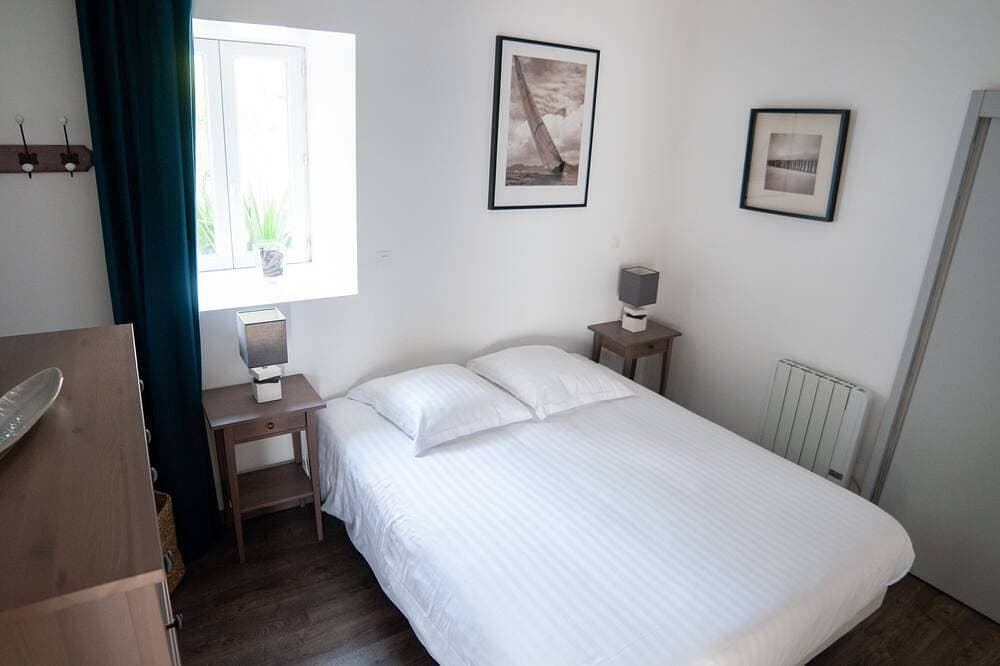 Foto 2 von 22: Freistehendes, 80 m² großes Einfamilienhaus im Küstenstil