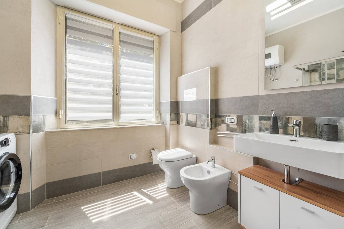 Foto 11 von 23: Ferienhaus 'Appartamento Elegante Carbonia' mit Balkon, WLAN und Klimaanlage