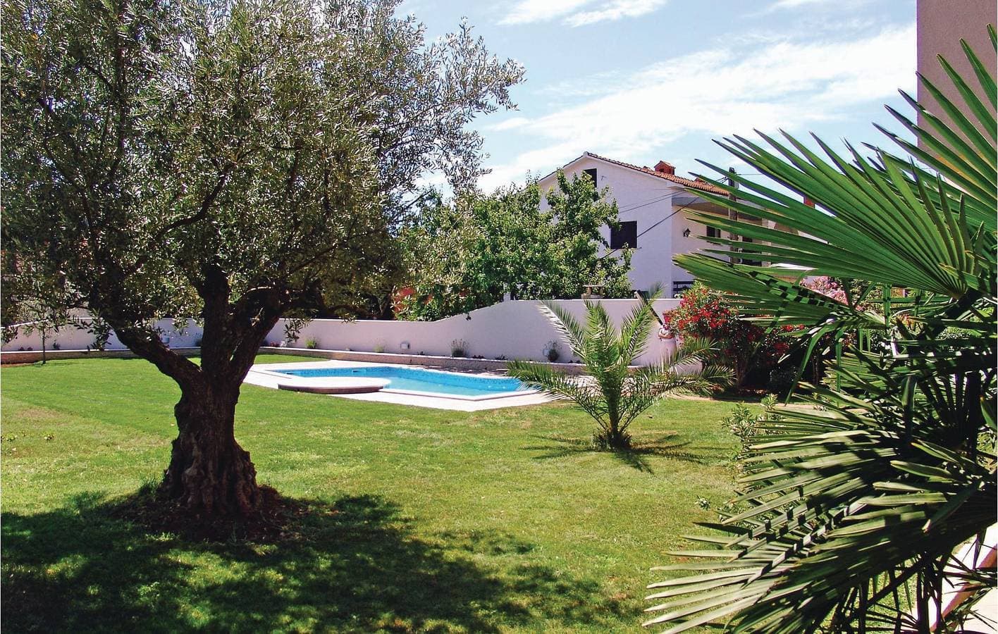 Foto 9 von 25: Apartment mit Meerblick, Pool, Terrasse und Parkplatz – 700 m vom Strand entfernt