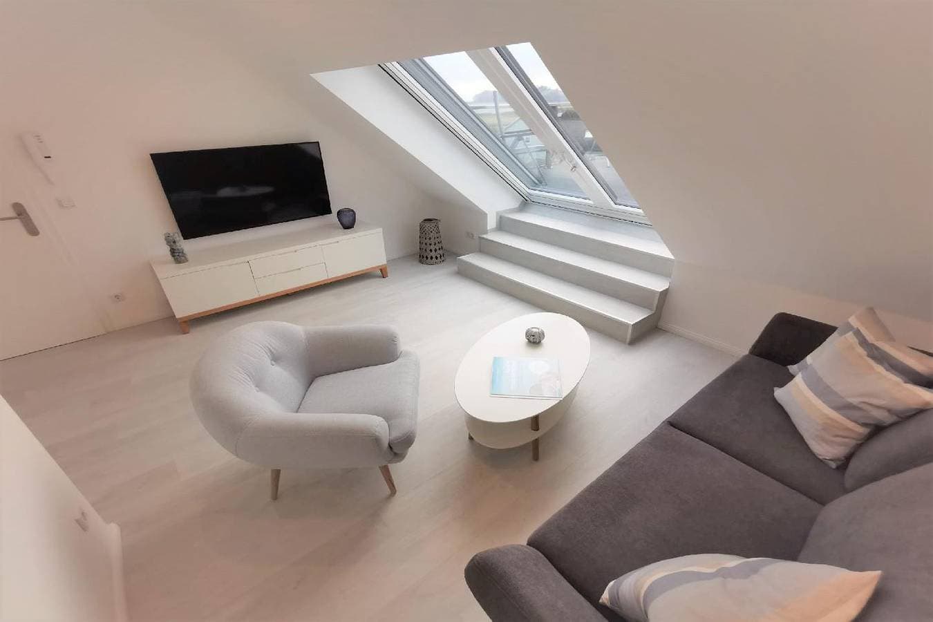 Foto 3 von 21: Ferienwohnung mit Dachterrasse und Meerblick - Haus Inselwind FeWo MEERwasser