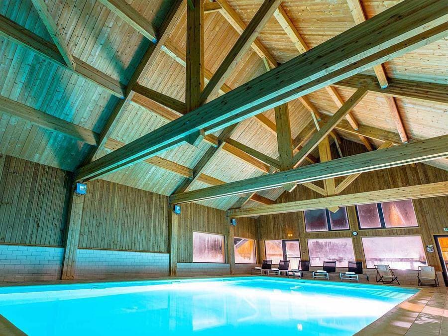 Foto 2 von 28: Madame Vacances - Résidence Les Chalets du Berger - Wohnung 4 personen