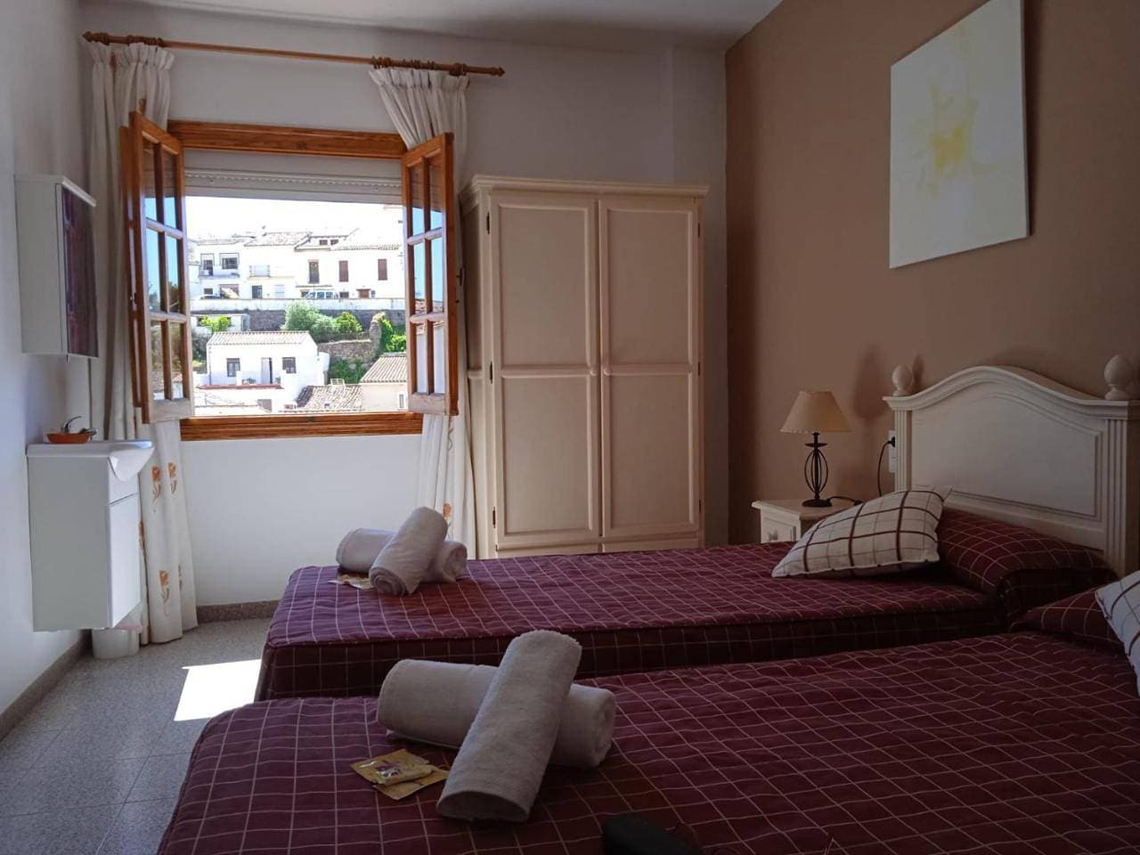 Foto 9 von 21: Double Room with Shared Bathroom