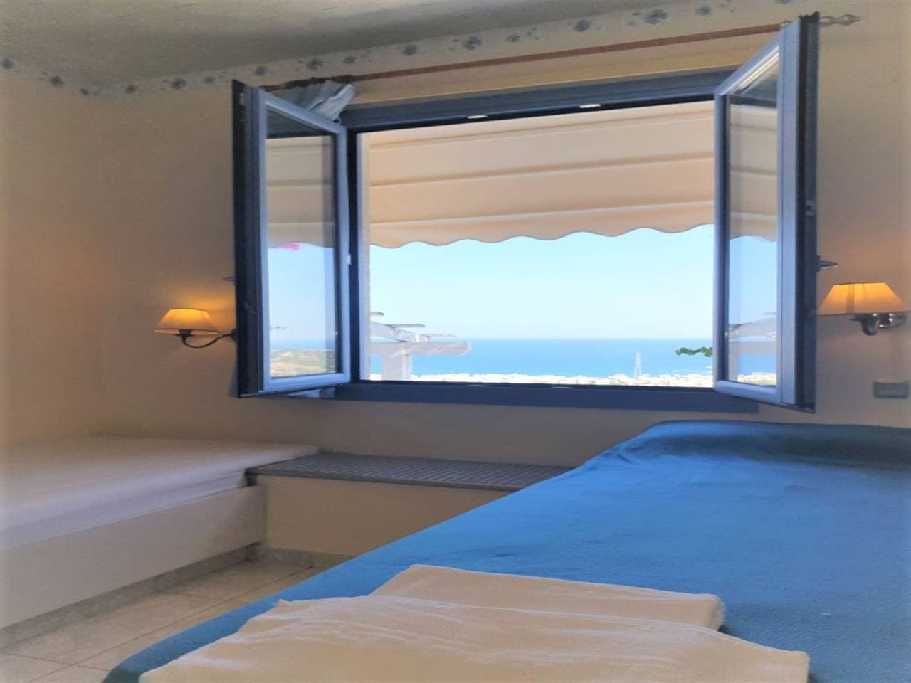 Foto 4 von 21: Ganze private Suite mit Meerblick mit Balkon, Gemeinschaftspool und Klimaanlage