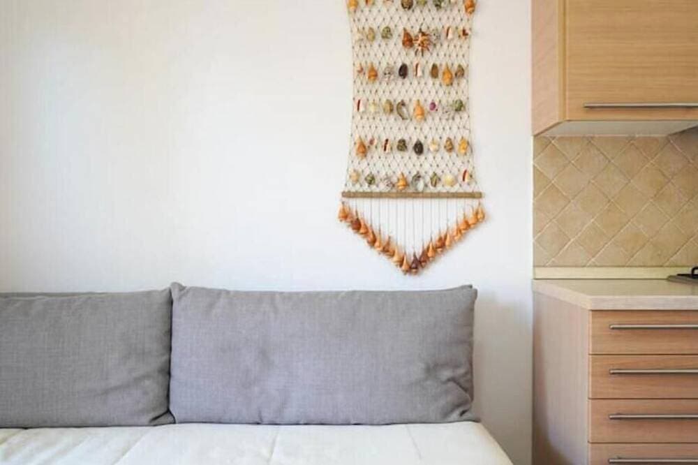 Foto 2 von 30: Apartment with Private Garden and Patio - Relaxation and Comfort Two Steps from the Sea