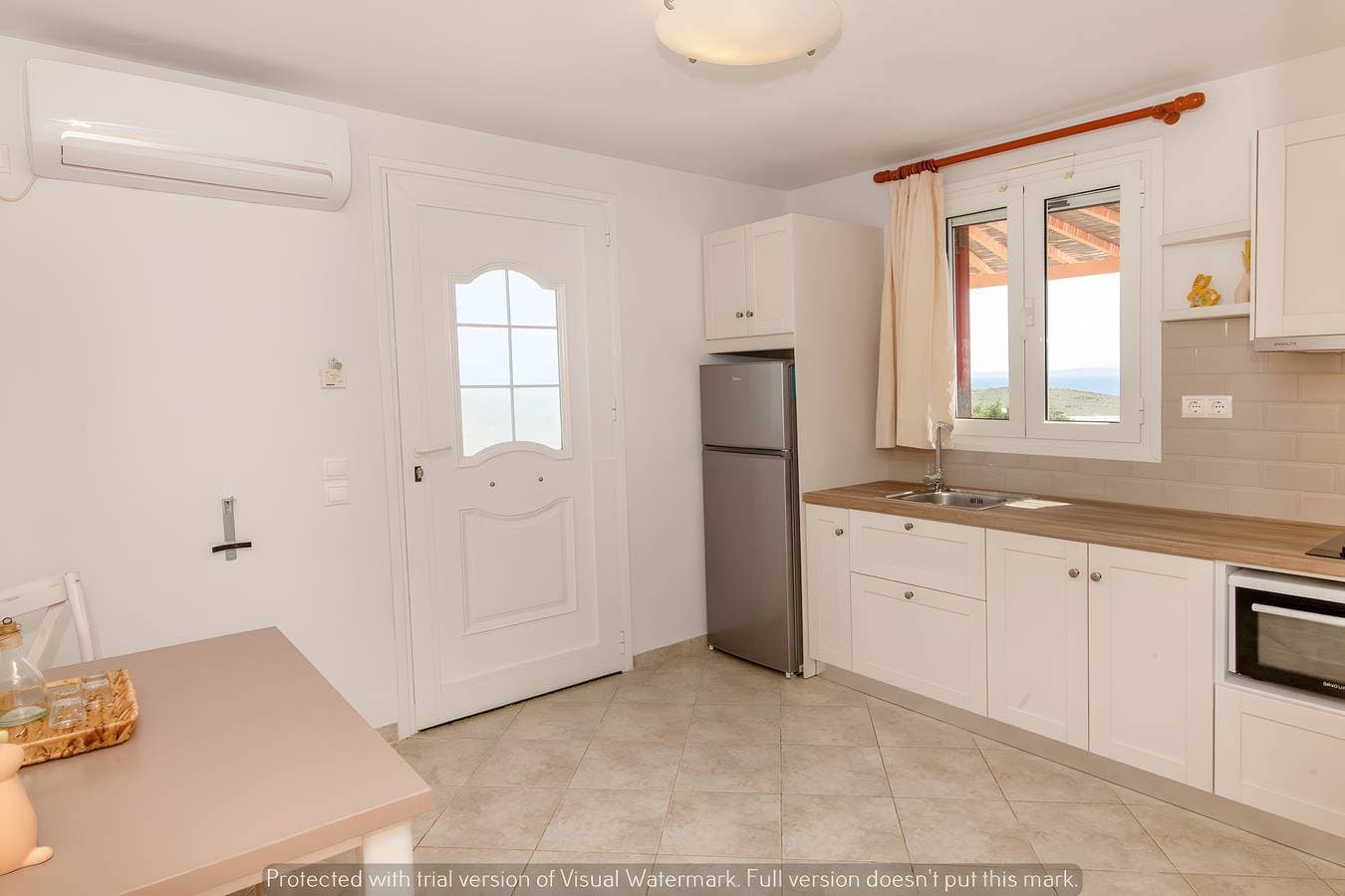 Foto 5 von 19: Ferienhaus 'Anemologio 201 Tinos' mit Meerblick, WLAN und Klimaanlage