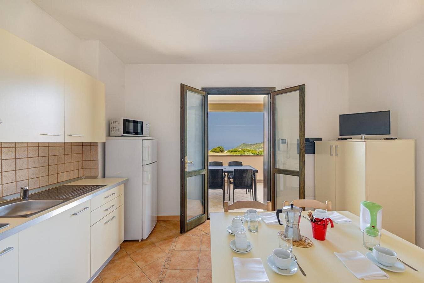 Foto 7 von 37: Residenza Le Farfalle 'A' mit Gartenblick, WLAN und Klimaanlage