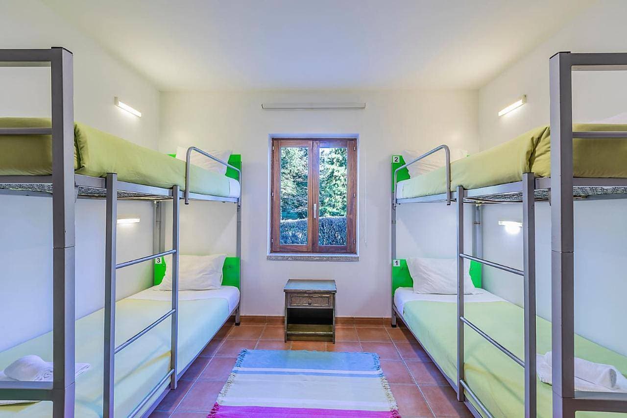 Foto 6 von 11: Quadruple Room with Shared Bathroom