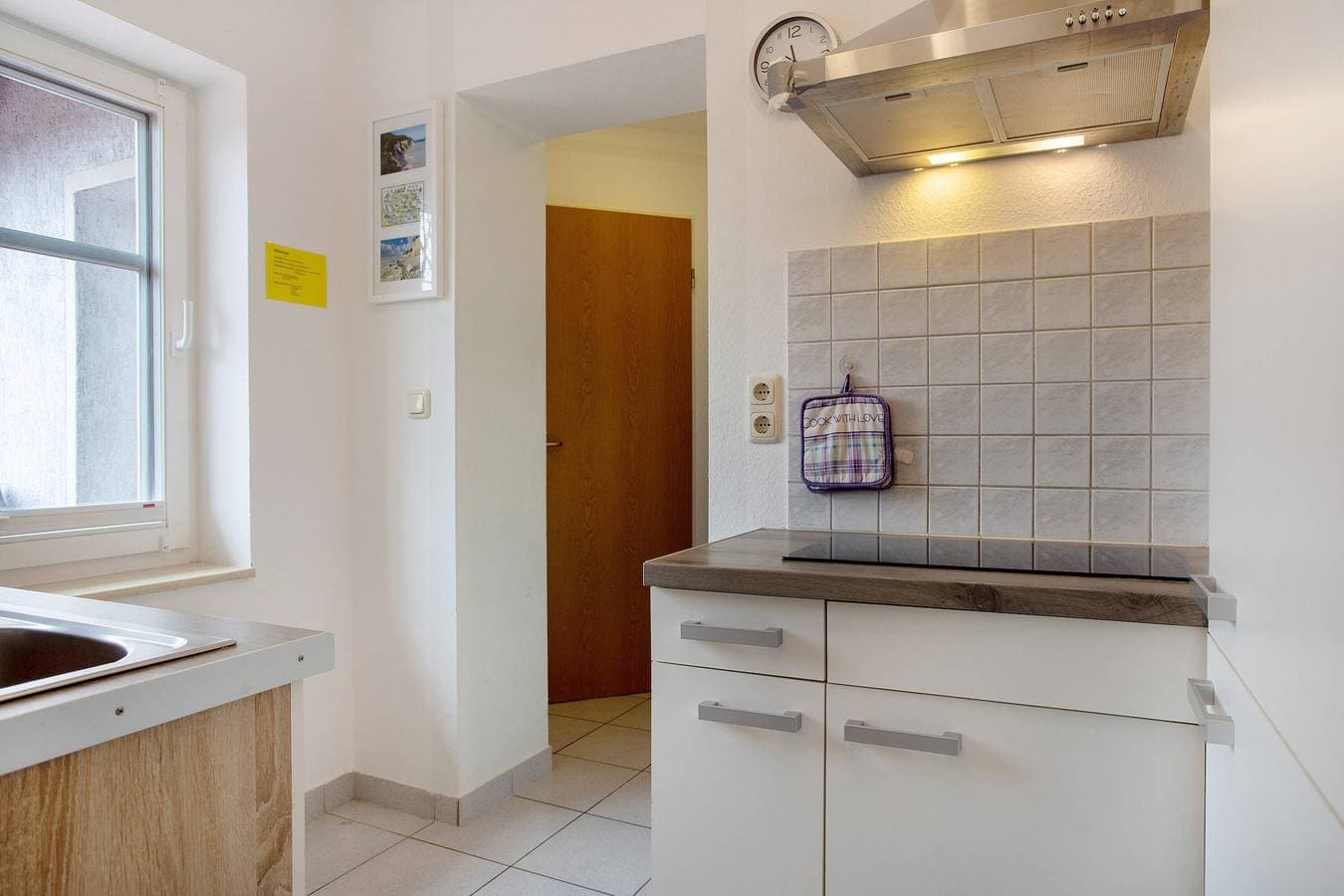 Foto 7 von 25: Ferienwohnung 'Bäckerhus - Ferienwohnung 6' mit Privatterrasse, Gemeinschaftsgarten und Wi-Fi