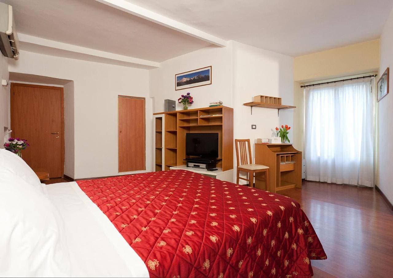 Foto 7 von 16: Quadruple Room
