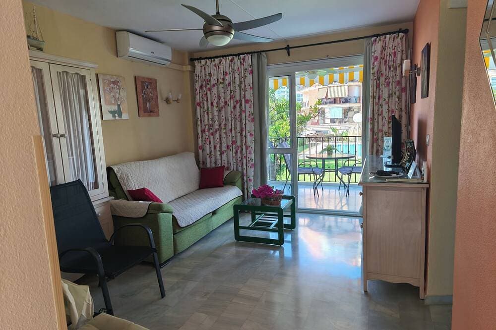 Foto 12 von 30: Wohnung in Torremolinos (La Carihuela Bereich) Erisa 1.