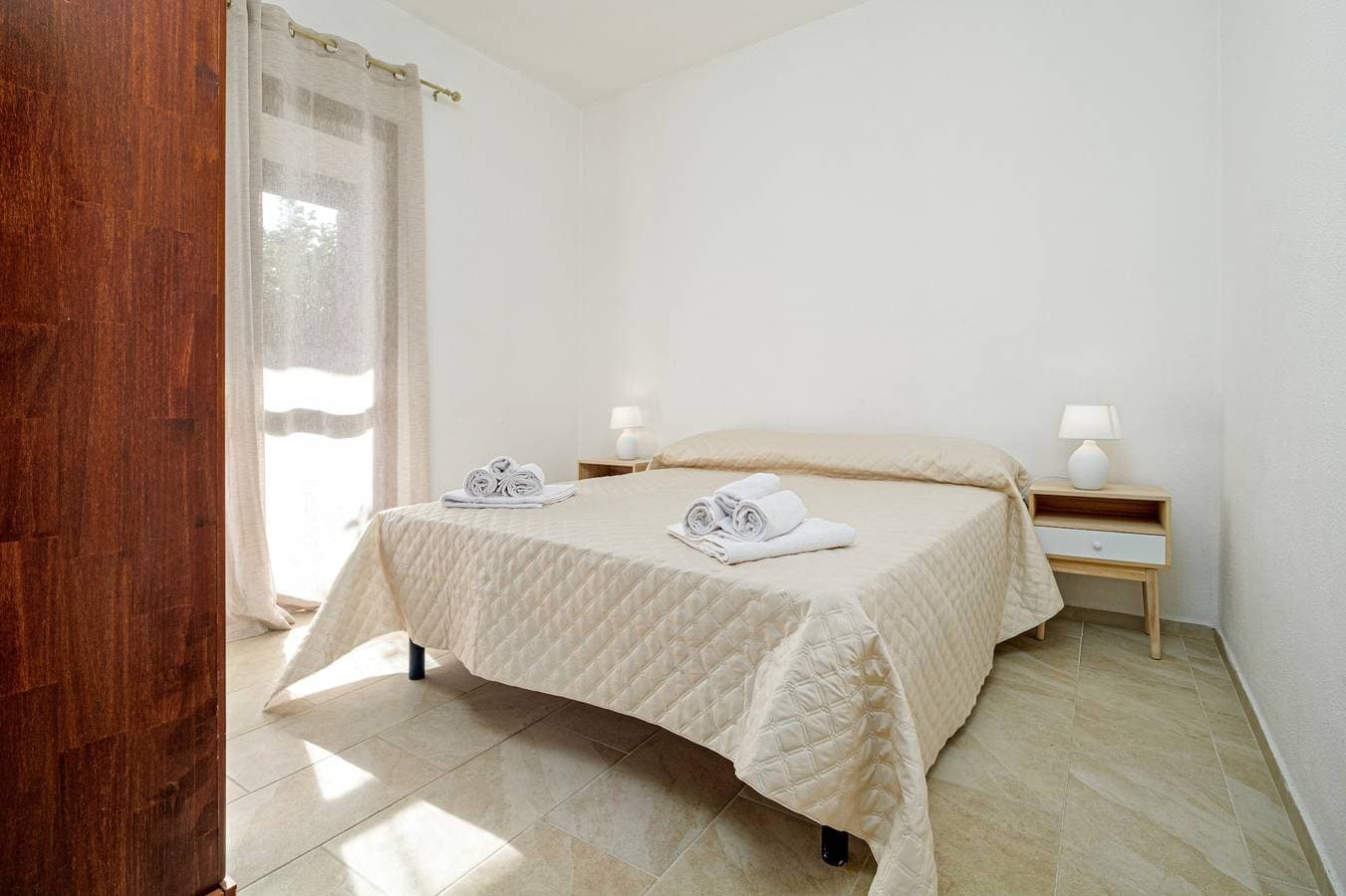 Foto 7 von 21: Apartment 'Brezza Marina - Garden' mit privater Terrasse, WLAN und Klimaanlage