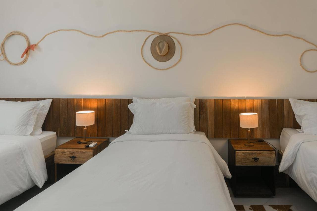 Foto 7 von 14: Luxury Triple Room