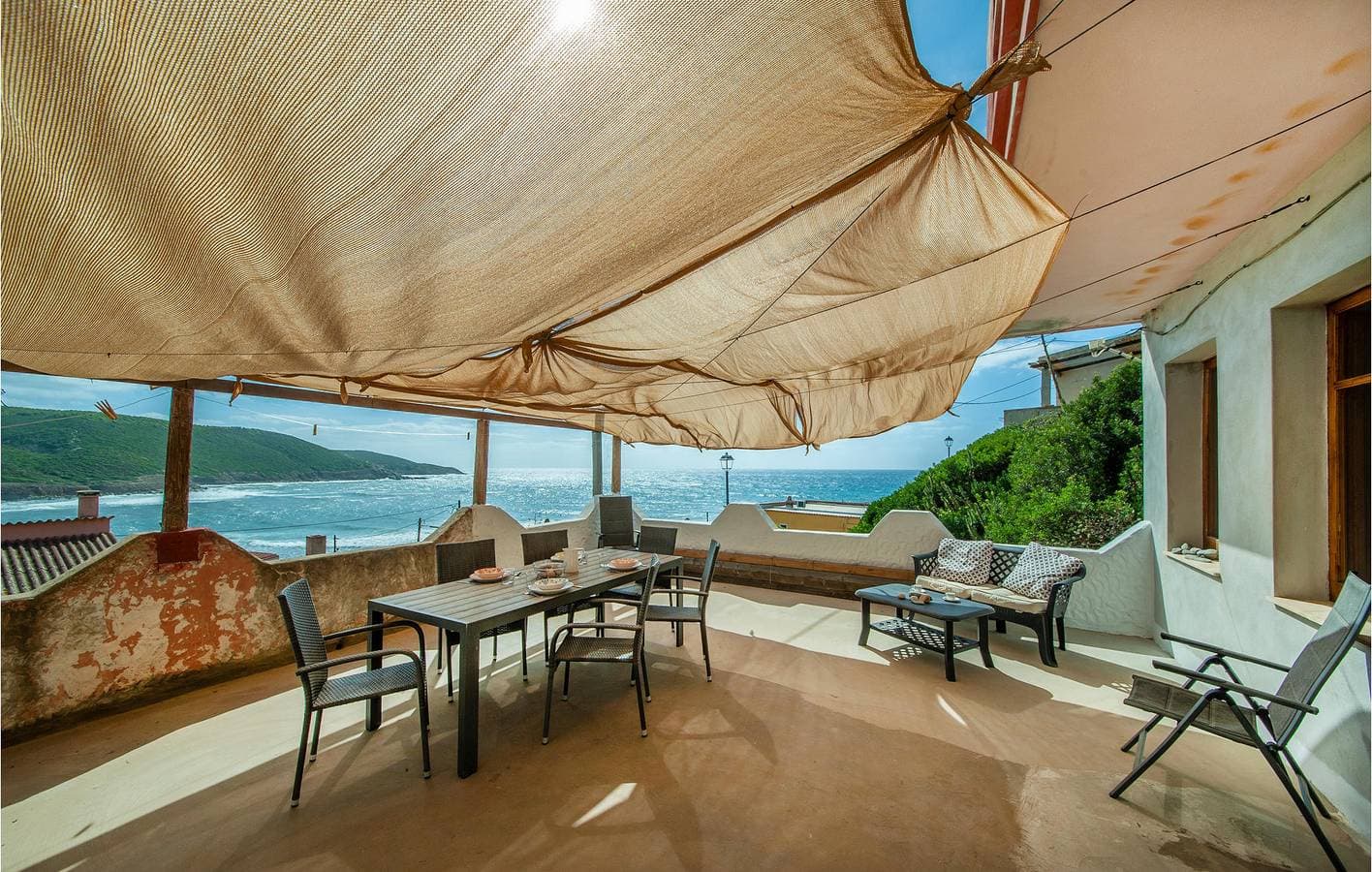 Foto 2 von 24: Gemütlicher Rückzugsort am Strand: WiFi, AC, Küche -600m zum Strand
