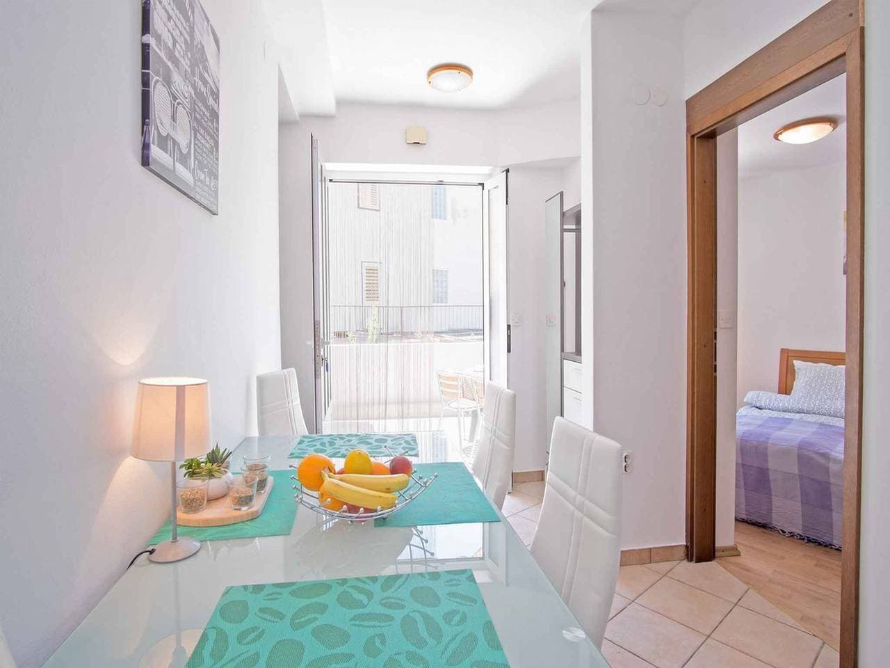 Foto 7 von 25: Ferienwohnung mit Klimananlage und Terrasse