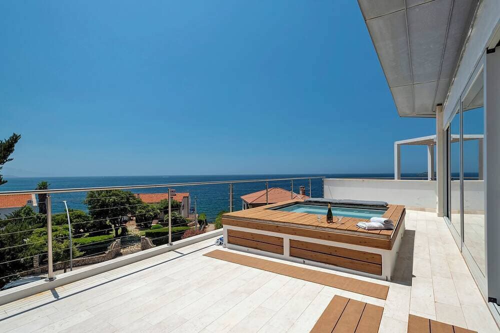 Luxury Seafront Villa with Rooftop Pool & Stunning Sea Views 1
