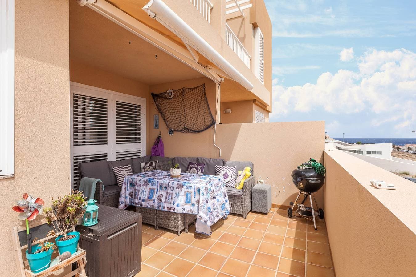 Foto 7 von 28: Apartment 'Apartamento El Porís' mit Meerblick, Gemeinschaftspool, Garten und WLAN