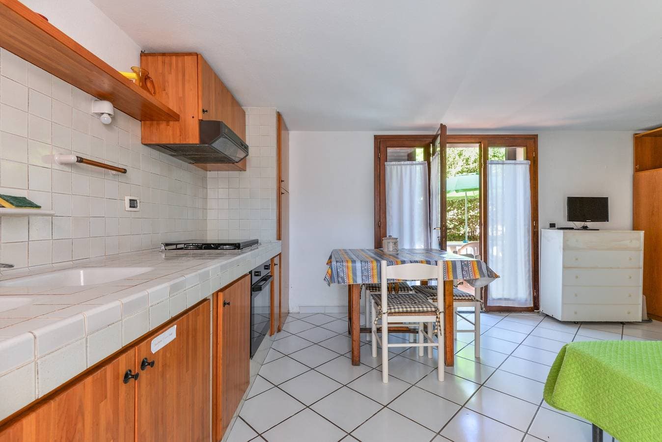 Foto 11 von 19: Einzimmerapartment 'Monolocale Nel Verde' mit Privatterrasse, Gemeinschaftsgarten und WLAN