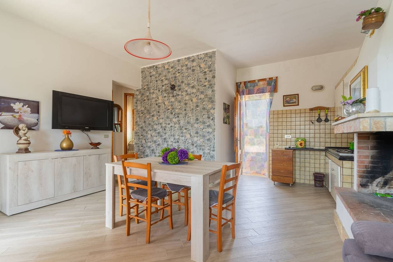 Foto 11 von 25: Ferienwohnung Amare 1 in Strandnähe mit überdachter Terrasse und Garten