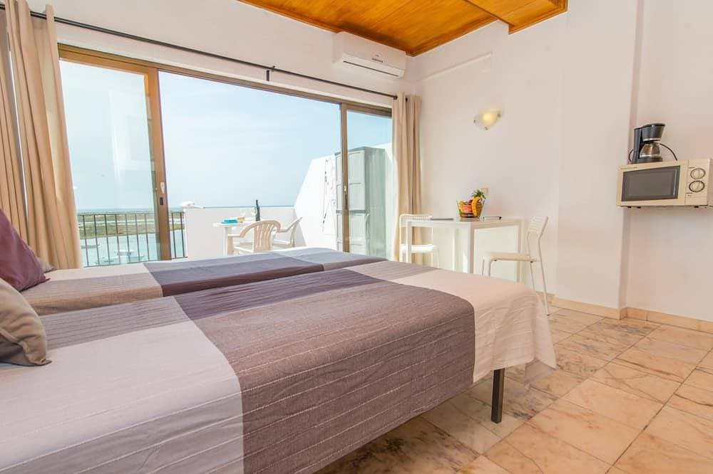 Foto 2 von 30: Studio Apartment with Sea View