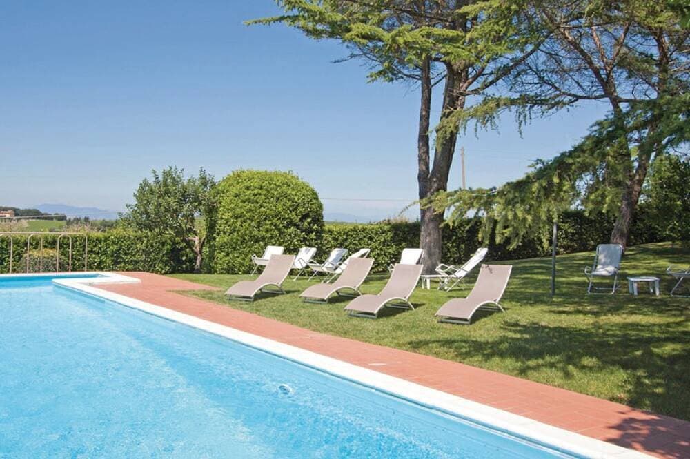 Foto 6 von 6: Comfortable studio apartment, terrace panoramic view of Chianti hills.