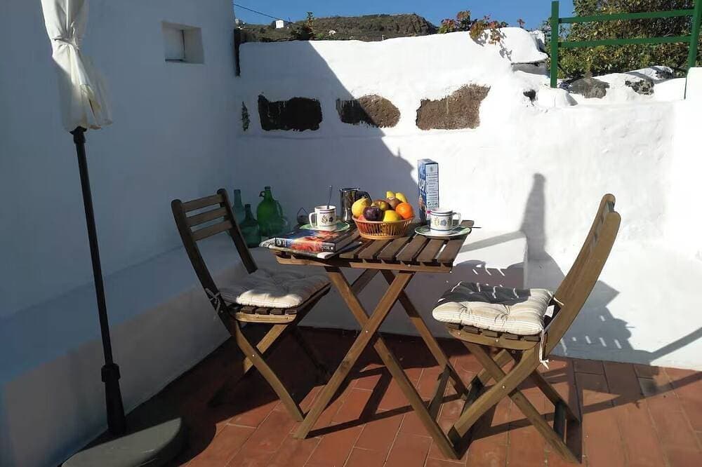 Foto 11 von 21: Cabaña en zona tranquila con bonitas vistas, acogedor estilo y cuidado jardín.