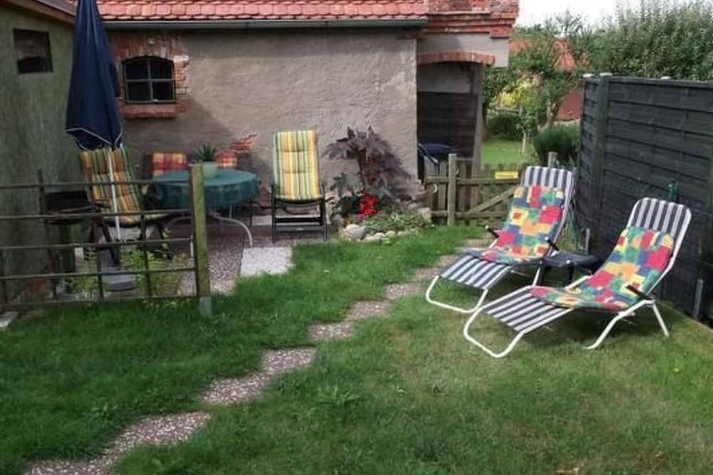 Foto 12 von 13: Appartement mit Garten, Grill und Terrasse