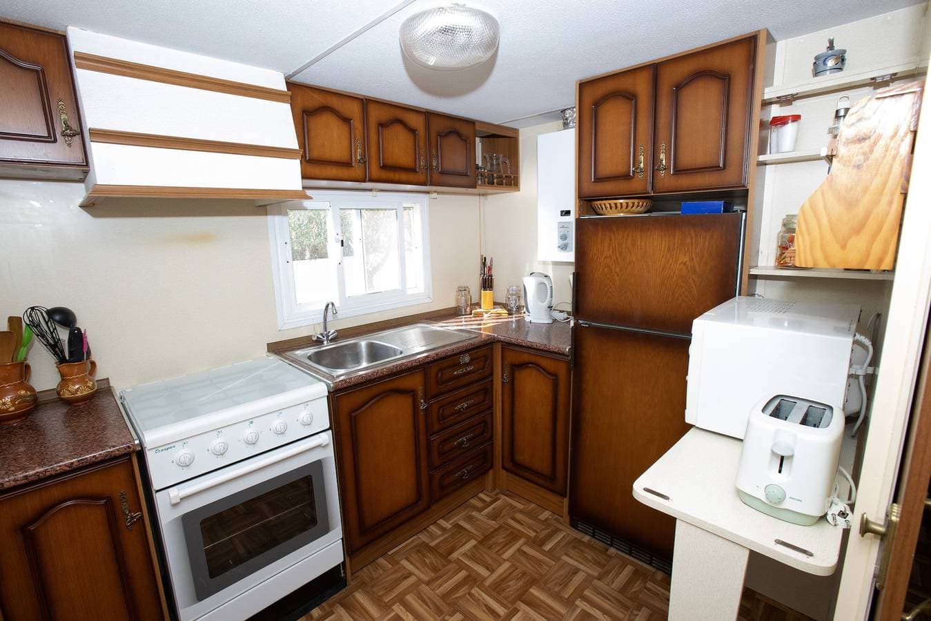 Foto 9 von 37: Wohnwagen 'Mobilhome Mit Garten Und Pool' mit Gemeinschaftspool, WLAN und Klimaanlage