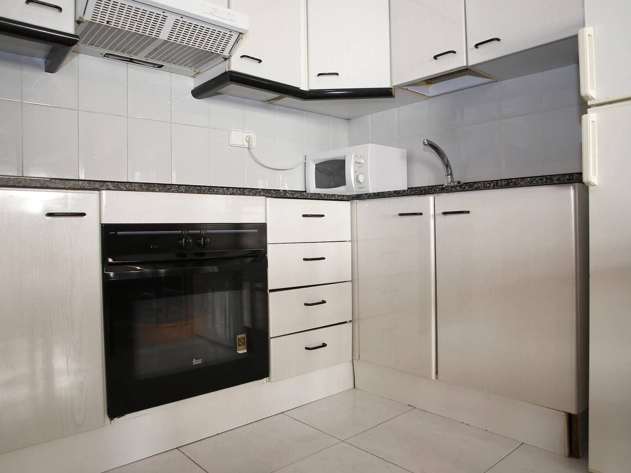 Foto 12 von 22: Wohnung mit 2 Pools und Gemeinschaftsgarten