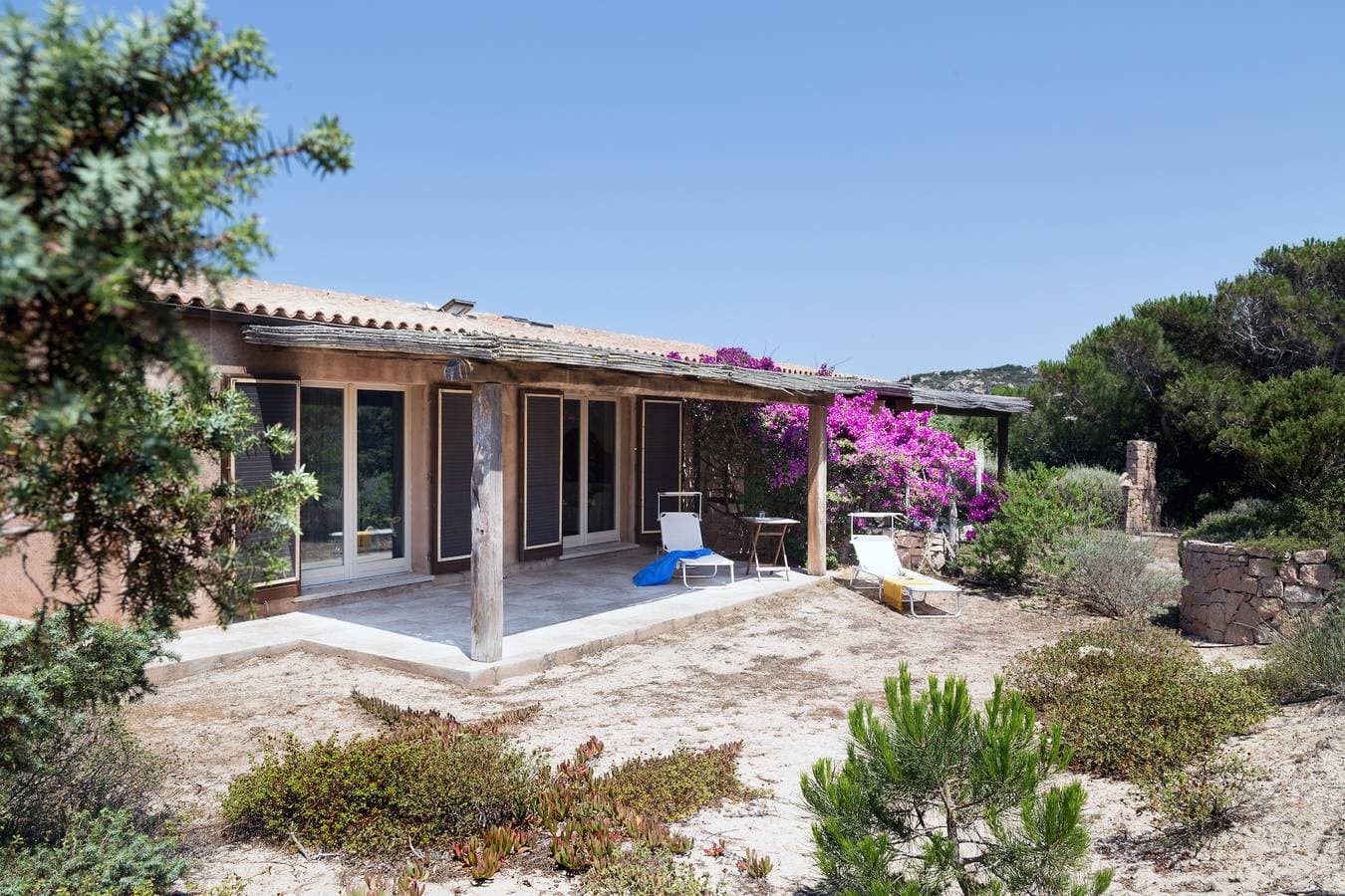 Foto 7 von 32: Villa 'I Graniti' in Strandnähe mit Meerblick, Patio, Klimaanlage und WLAN